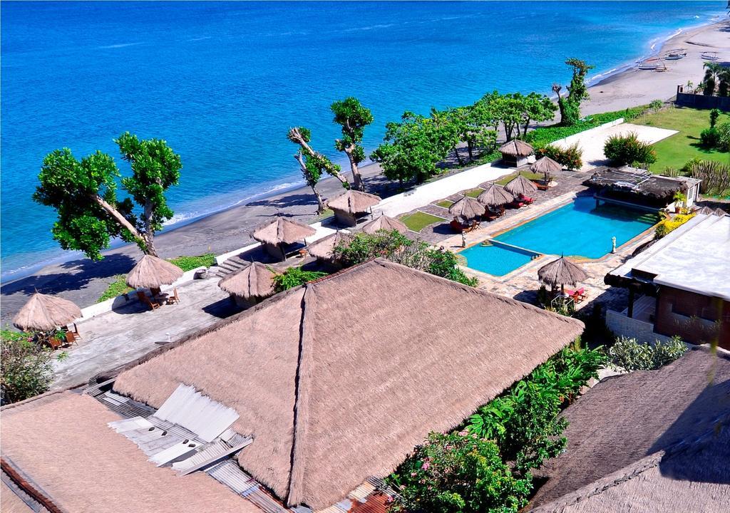Pasific Beach Cottages Mangsit Exterior photo