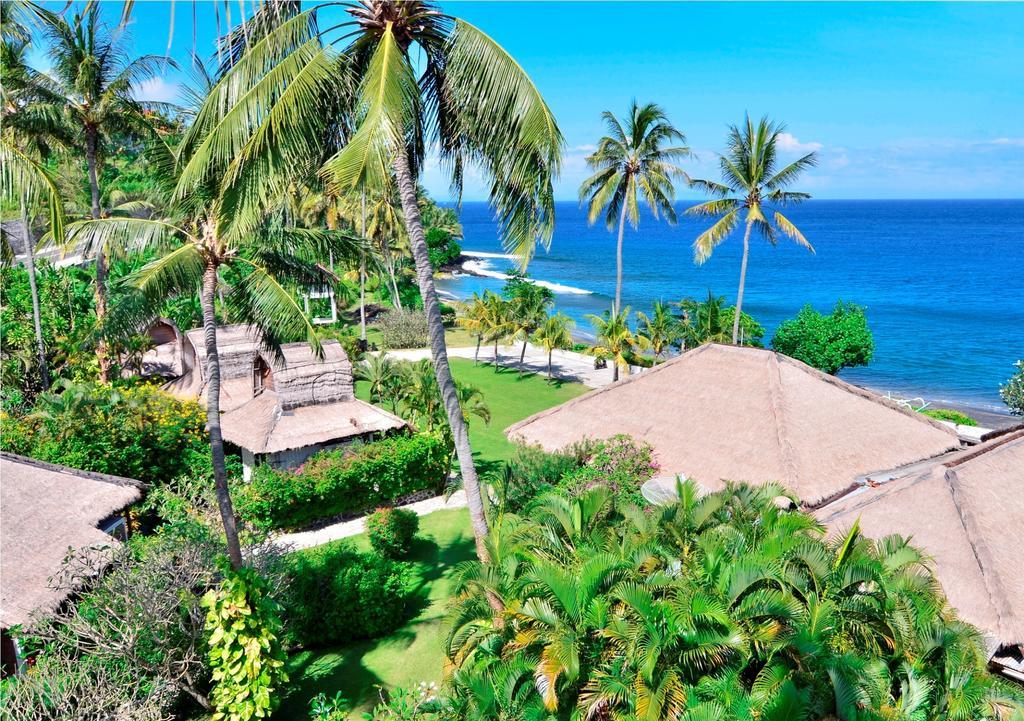 Pasific Beach Cottages Mangsit Exterior photo